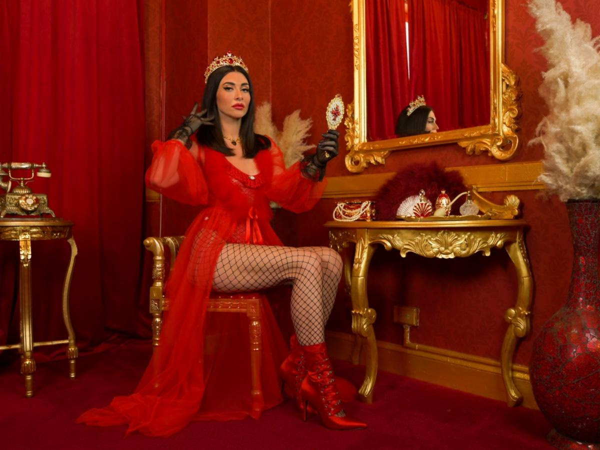 Indie rapper Qveen Herby aims to define herself with debut album “A WOMAN”